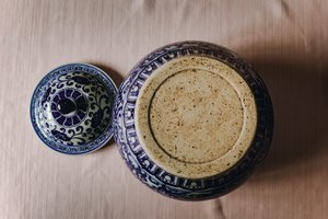 青花海水翼龙缠枝花卉纹盖罐